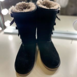 Black Ugg boots with bows
